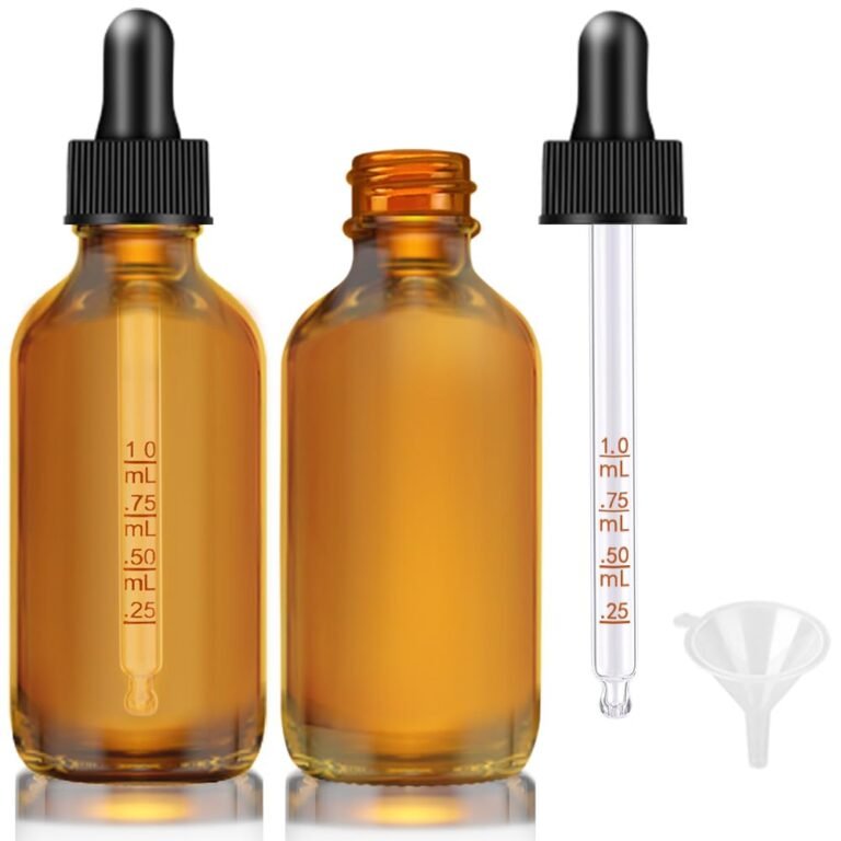 Amber glass bottles with droppers and a small funnel
