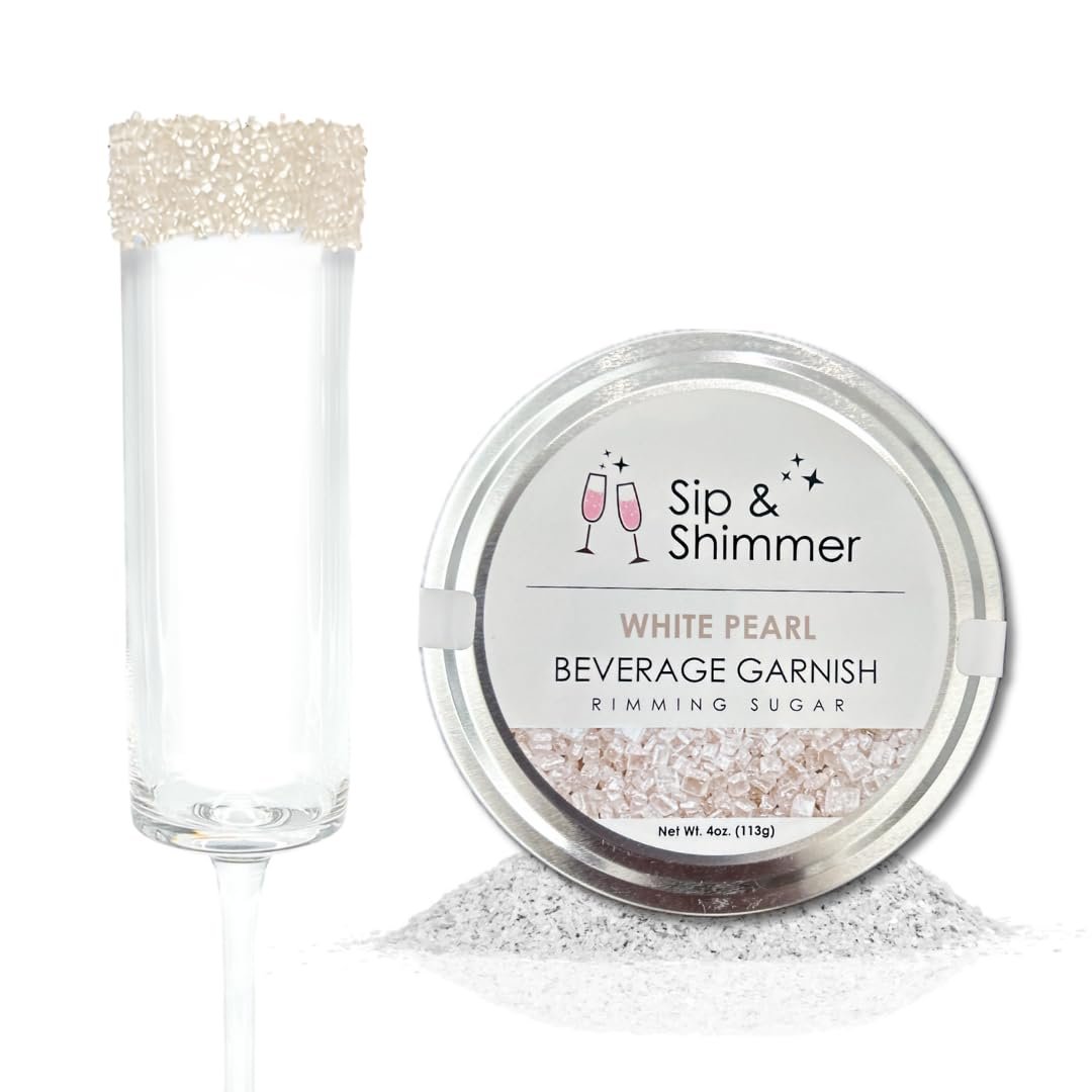 Champagne flute with sugar rim next to a container of rimming sugar