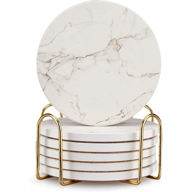 Marble coasters in a gold metal holder, stacked and displayed