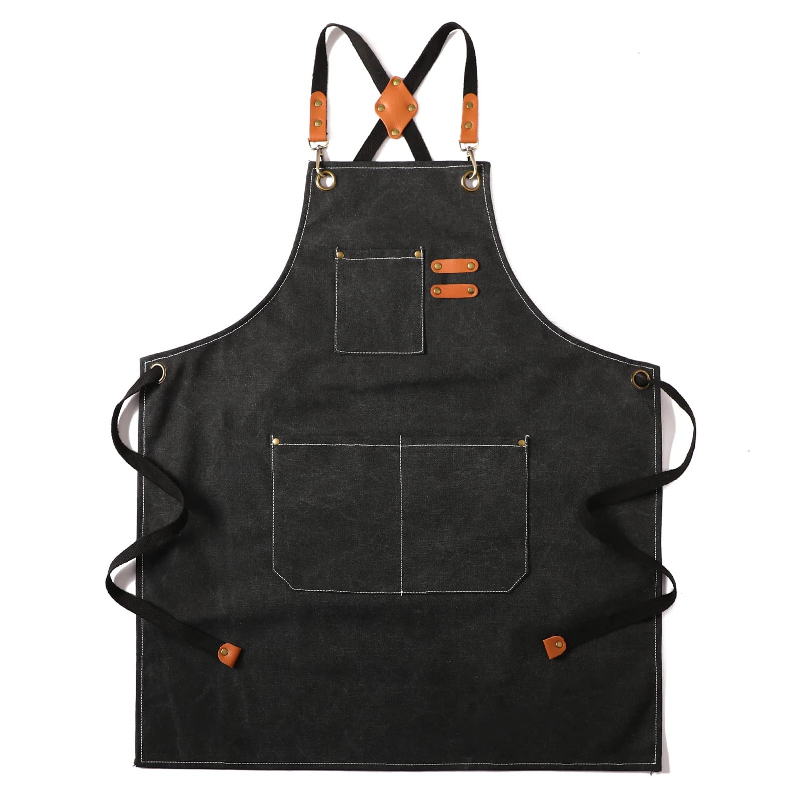Black apron with leather straps, pockets, and white stitching on a white background