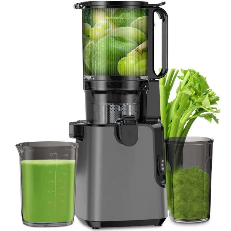 Juicer with fruit and celery, juice in a measuring cup, and pulp in a container